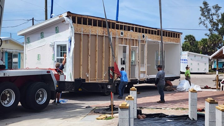 Installing new home at 413 Dije St.<br> Photos by Dan Mclean - Slide 9 width=